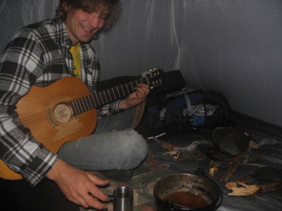 tea and guitar in the tent